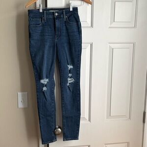 Levi’s 721 high rise skinny distressed jeans